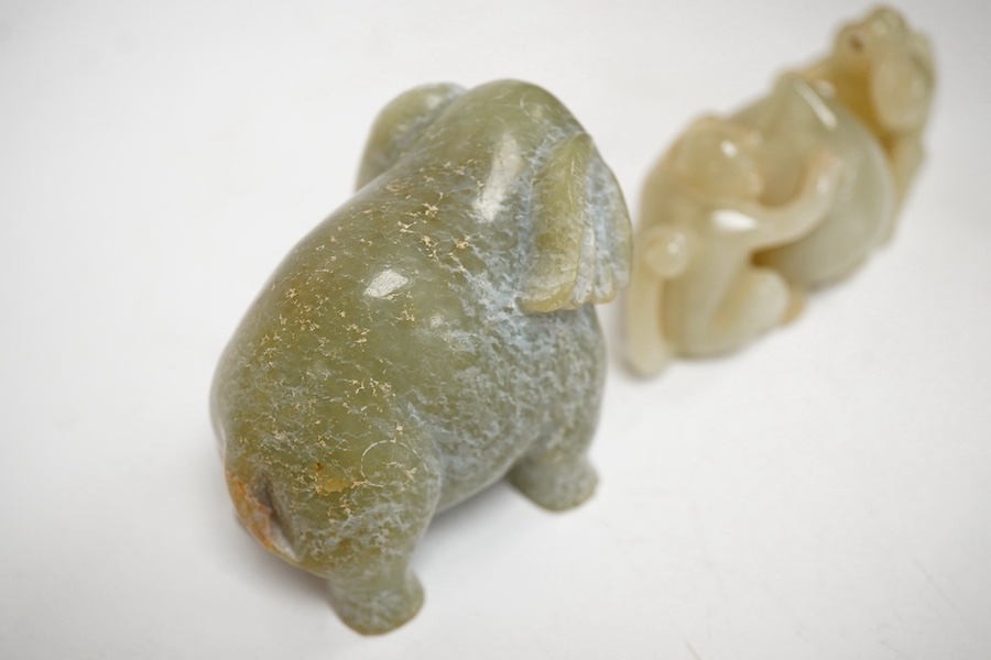 A Chinese jade monkey group and a bowenite jade elephant, largest 9cm wide. Condition - good (2)